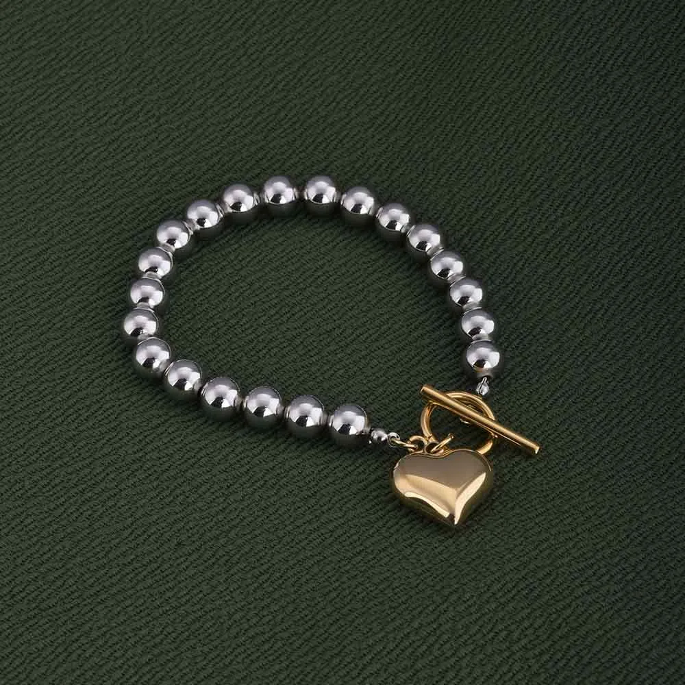 Silver Bead Bracelet with Gold Heart Charm
